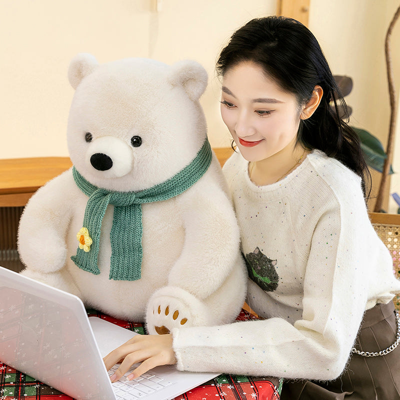 Polar bear wearing scarf
